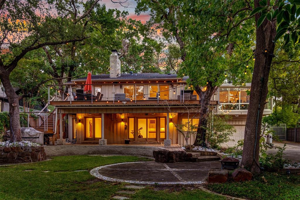 13311 Purple Sage Road Dallas, TX 75240 - Photo 29 of 31 a front view of a house with a garden