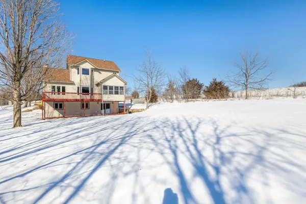 a view of a pathway with a patio