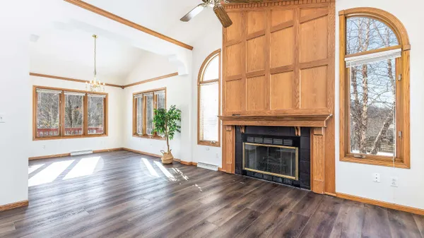 a view of empty room with a ceiling fan