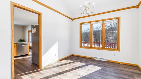 a kitchen with stainless steel appliances granite countertop a stove and a microwave