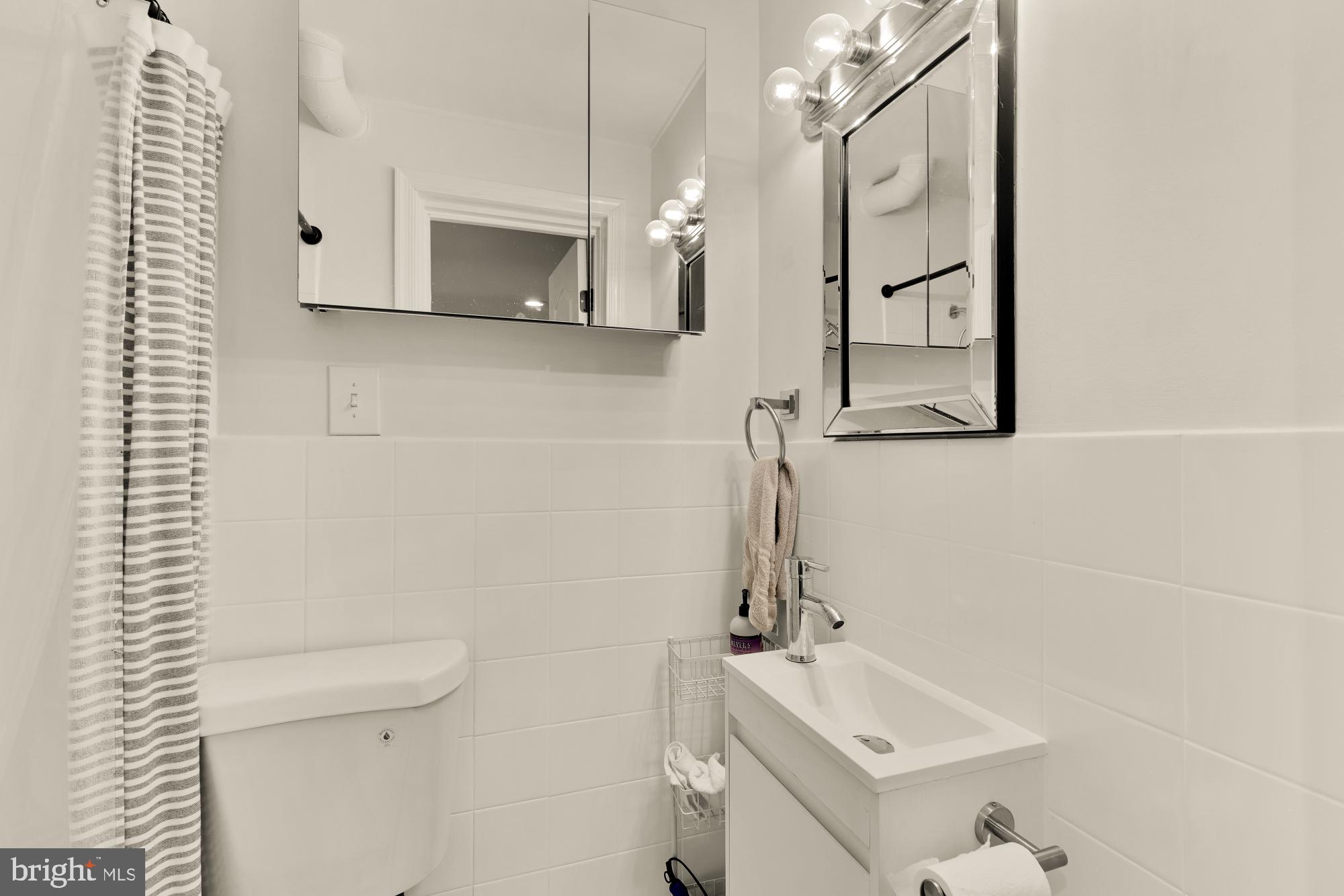 11170 Forest Edge Drive Reston, VA 20190 - Photo 28 of 35 Updated basement bathroom