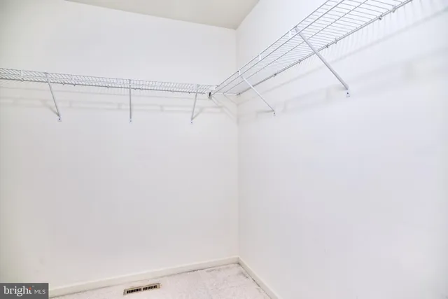 a view of a room with racks on the wall