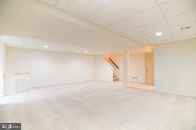 en empty room with windows