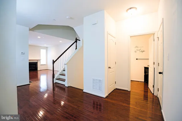 a view of entryway with wooden floor