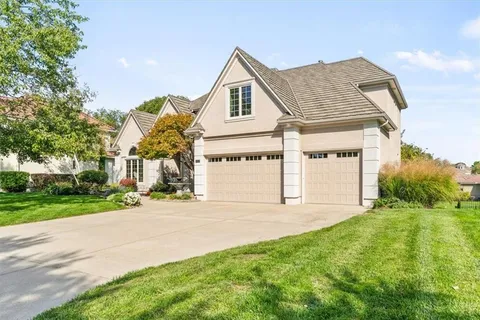 $785,000 | 708 Northeast Lake Point Drive, Lee's Summit, MO 64064