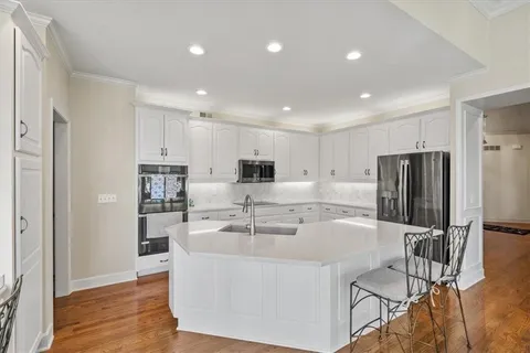 $785,000 | 708 Northeast Lake Point Drive, Lee's Summit, MO 64064