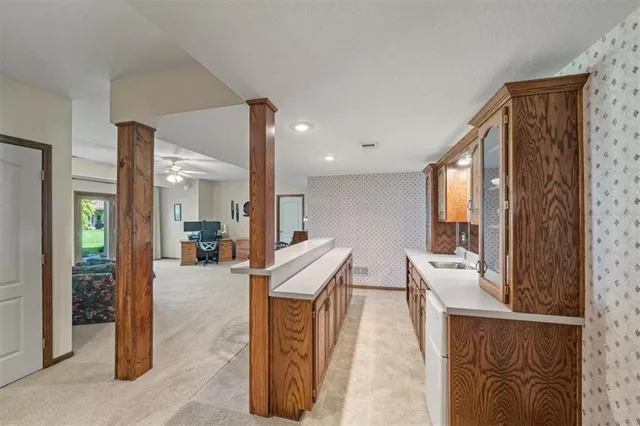 $785,000 | 708 Northeast Lake Point Drive, Lee's Summit, MO 64064