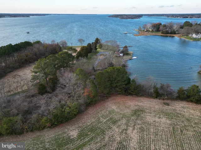 a view of a house with a field