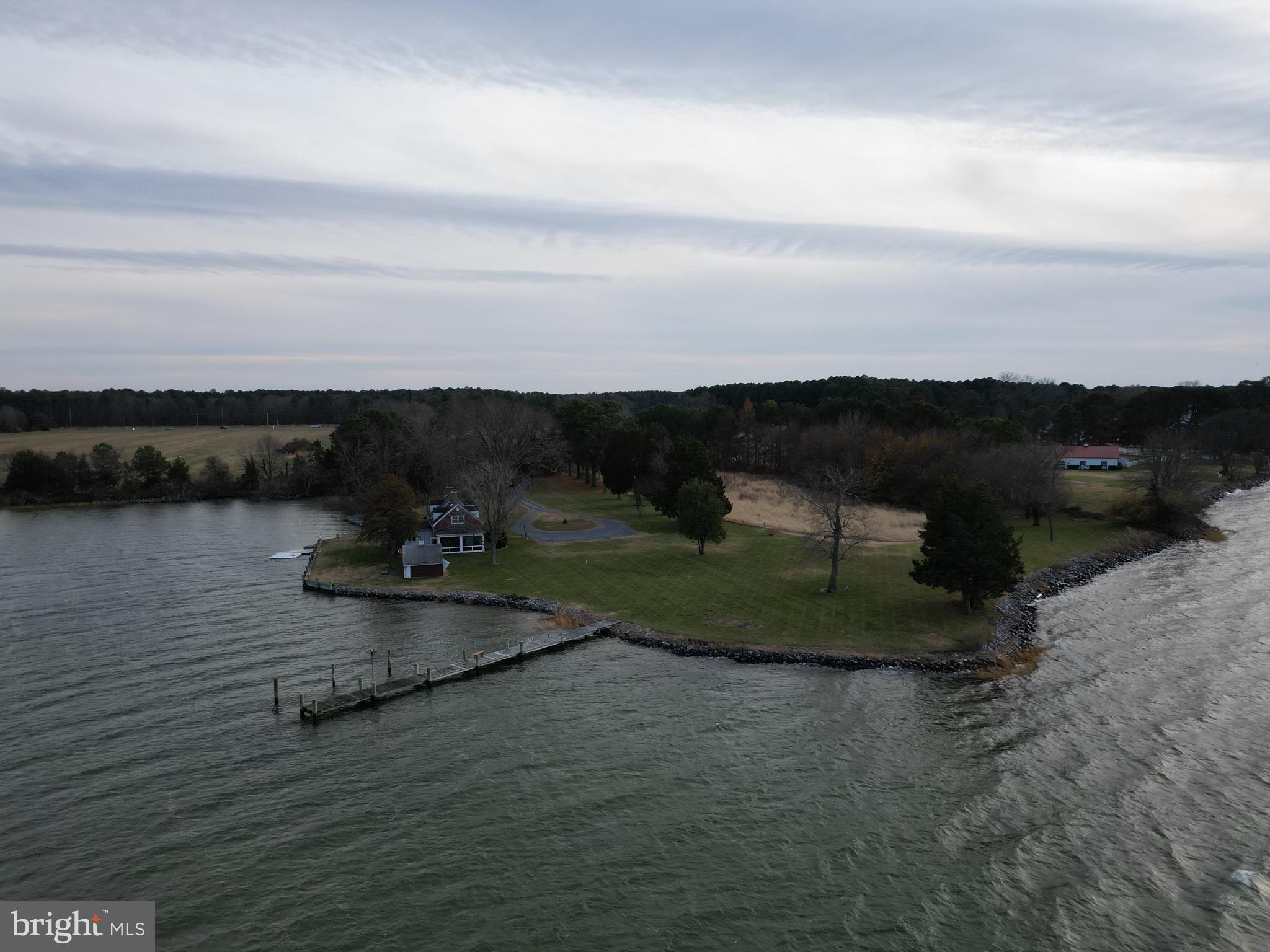 26396 St Michaels Road Easton, MD 21601 - Photo 20 of 23 a view of a lake with a mountain in the background