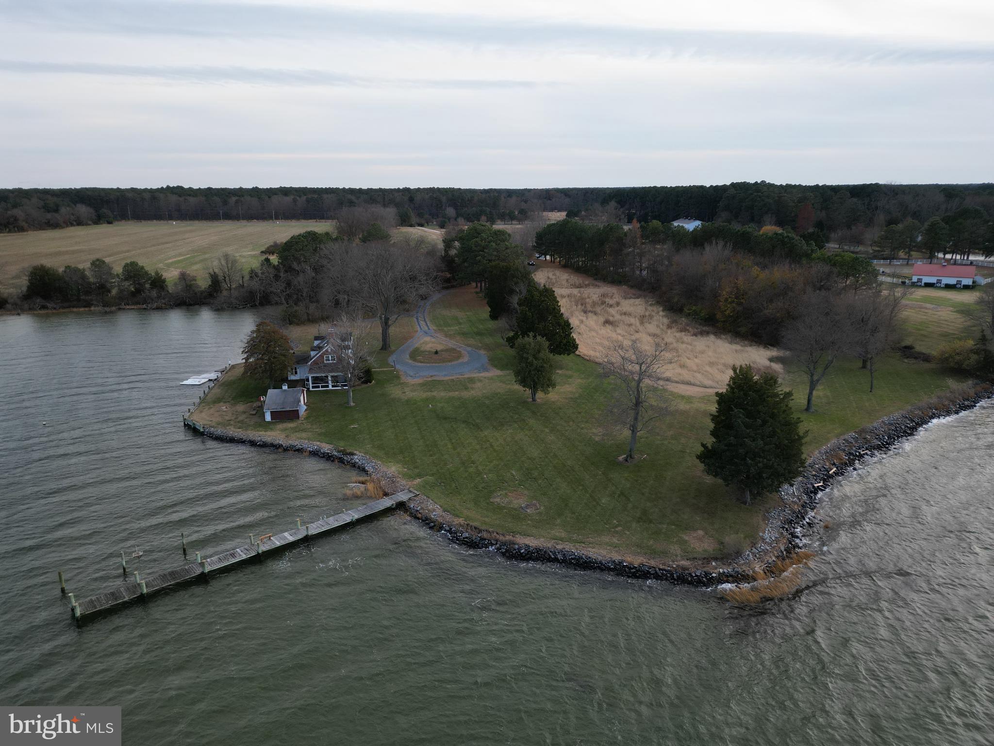 26396 St Michaels Road Easton, MD 21601 - Photo 22 of 23 an aerial view of a house with a yard