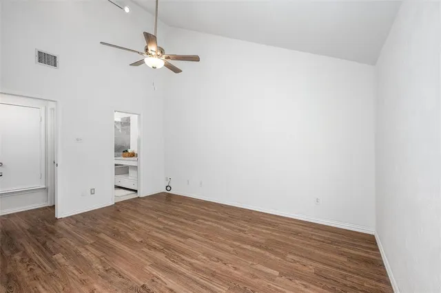 a view of a livingroom with wooden floor