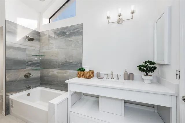a bathroom with a sink and a bathtub