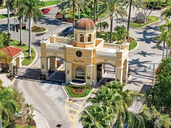 a view of a garden with a building in the background
