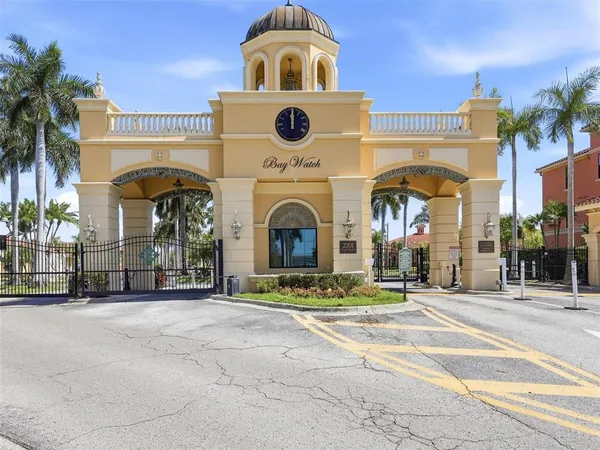 a front view of house with yard swimming pool and outdoor seating