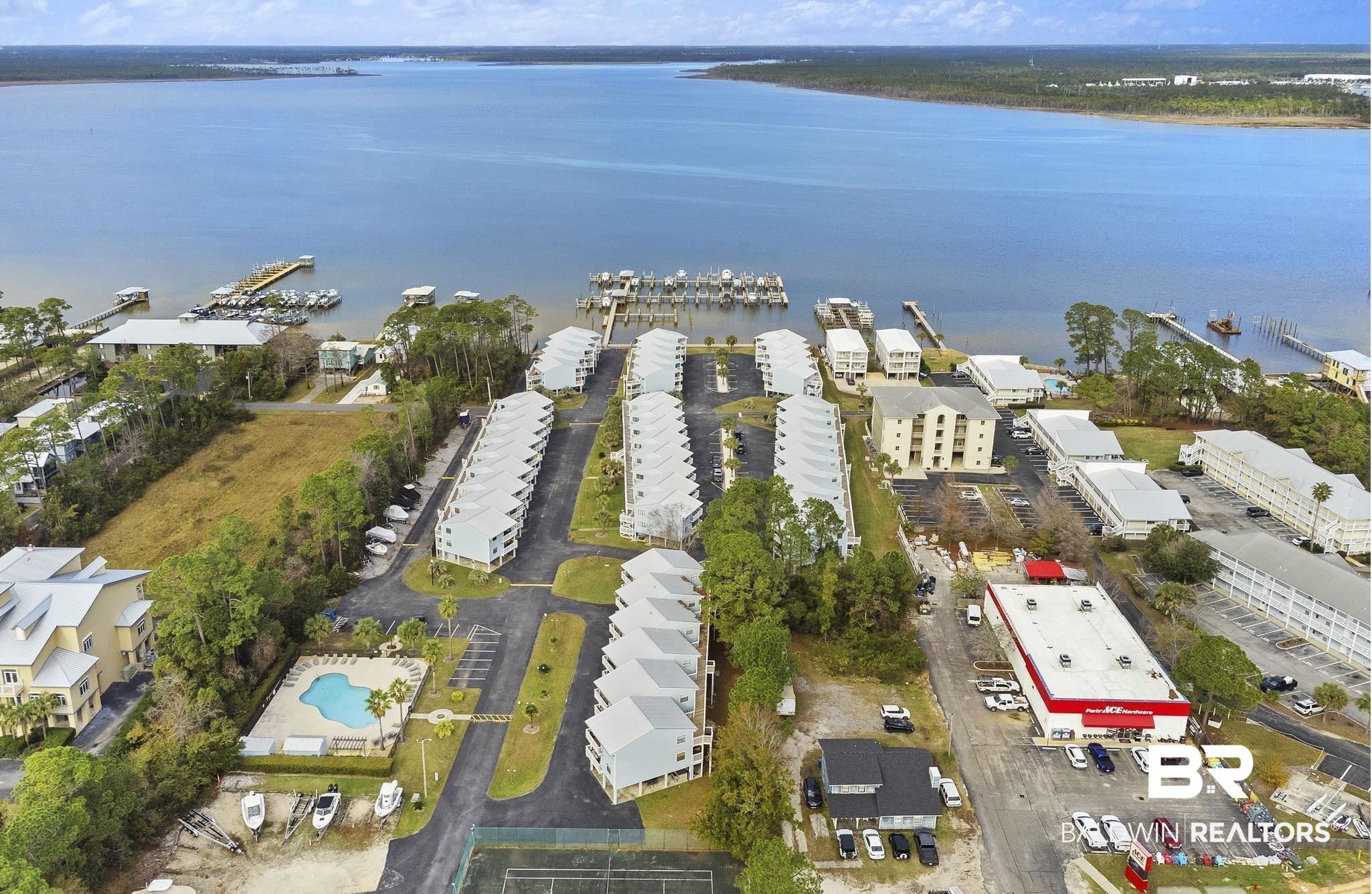 25861 Canal Road, Unit 77 Orange Beach, AL 36561 - Photo 5 of 48 Drone / aerial view of a nearby body of water