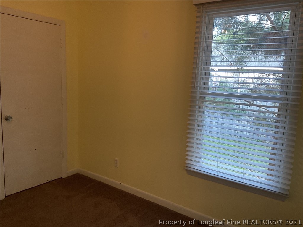2279 Hackney Loop Fayetteville, NC 28304 - Photo 8 of 11 a view of a small space with a window