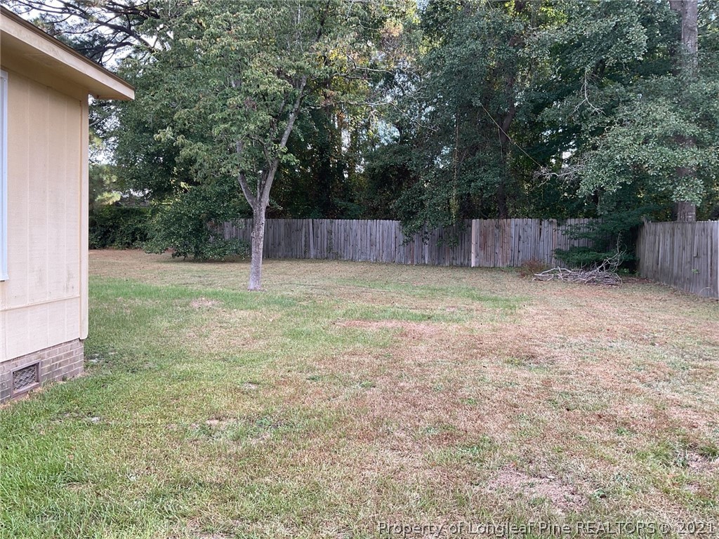 2279 Hackney Loop Fayetteville, NC 28304 - Photo 10 of 11 a view of backyard with green space