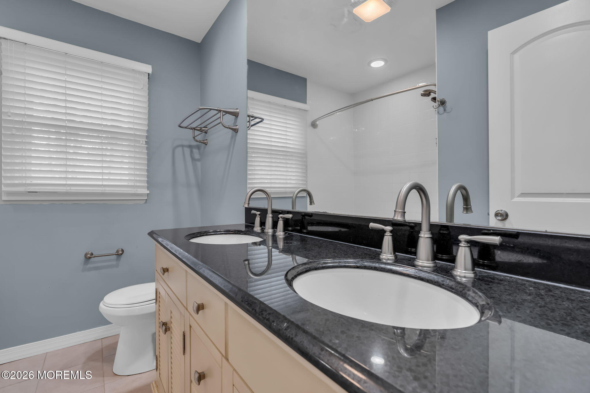593 Beach Plum Road Brick, NJ 08723 - Photo 26 of 38 a bathroom with a granite countertop double vanity sink toilet and a mirror