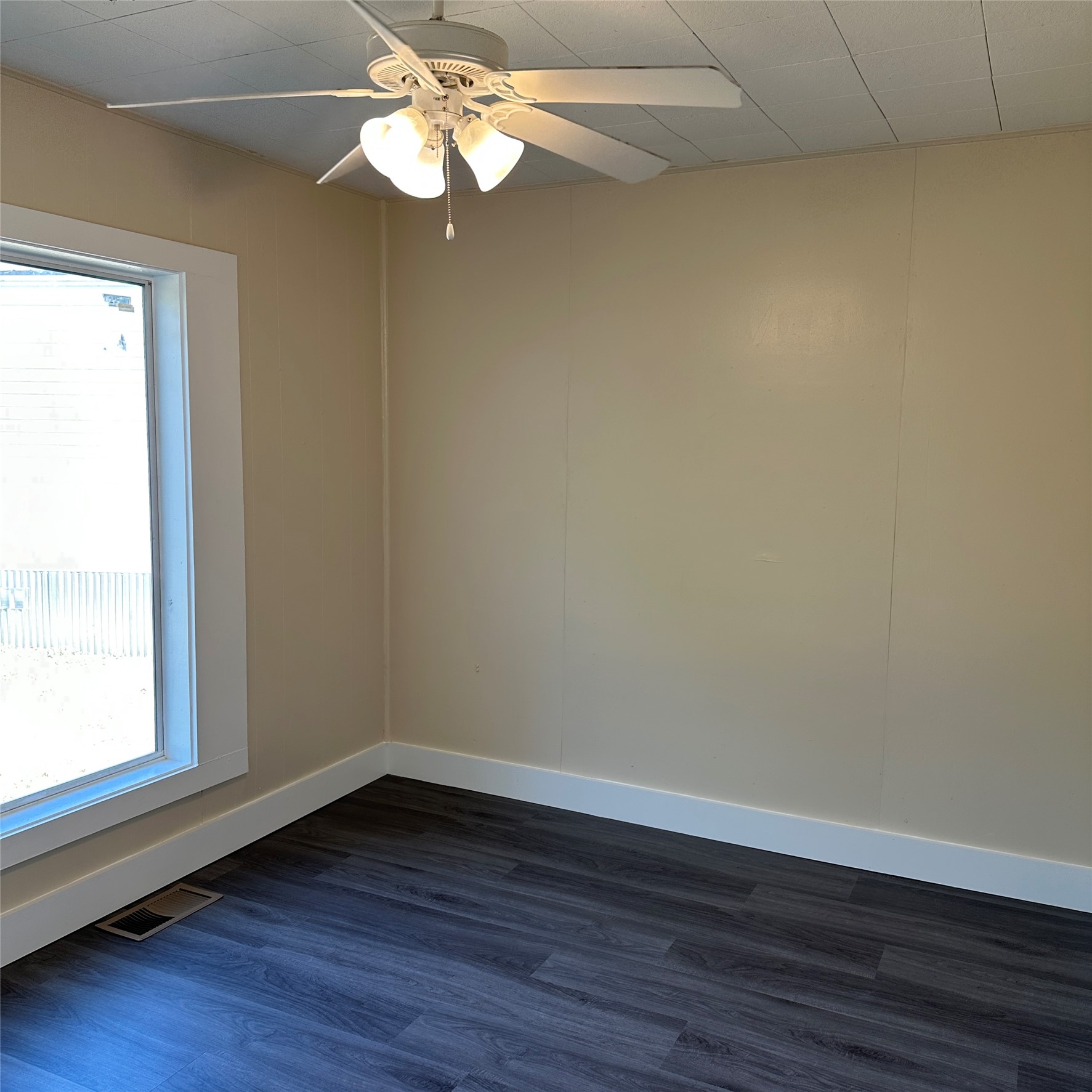 1321 Harris Hill Road San Marcos, TX 78666 - Photo 11 of 11 a view of a room with wooden floor and a window