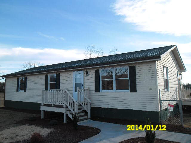 6933 Briery Branch Road Dayton, VA 22821 - Photo 1 of 17 a backyard of a house with seating space