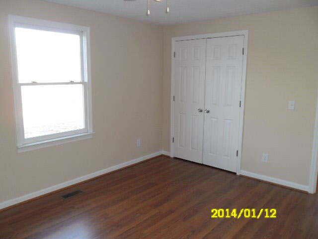 6933 Briery Branch Road Dayton, VA 22821 - Photo 15 of 17 an empty room with hallway