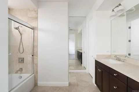 a kitchen with a sink a stove and refrigerator