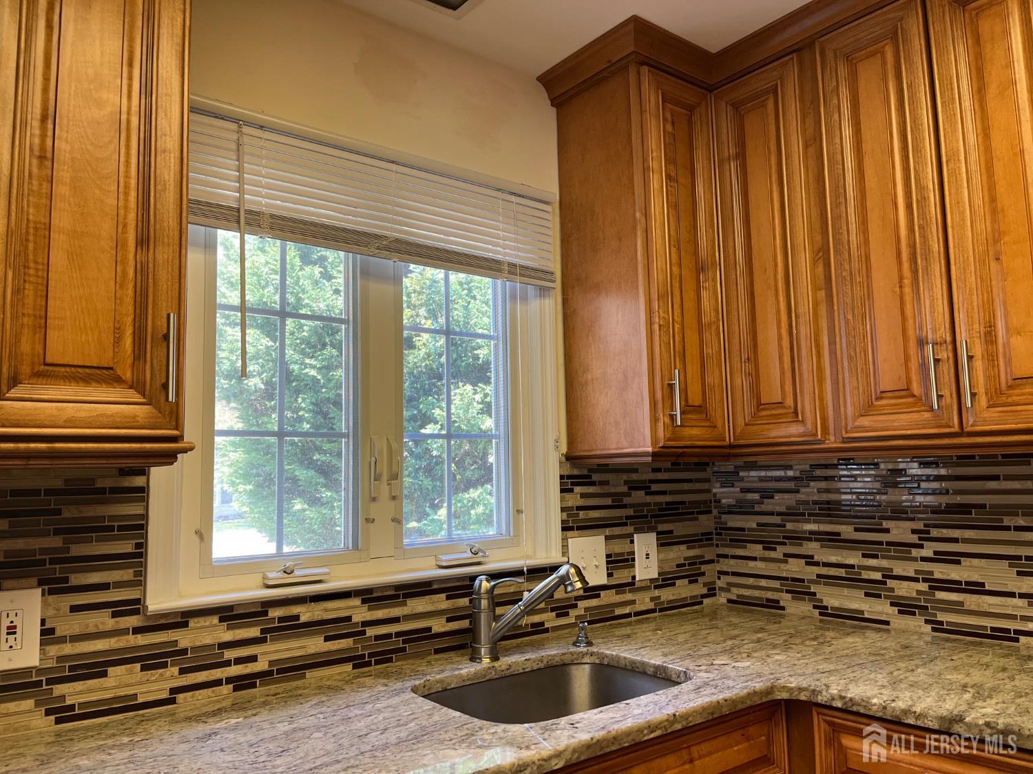 333 Newport Way, Unit C Monroe Township, NJ 08831 - Photo 11 of 17 a kitchen with a sink and a window