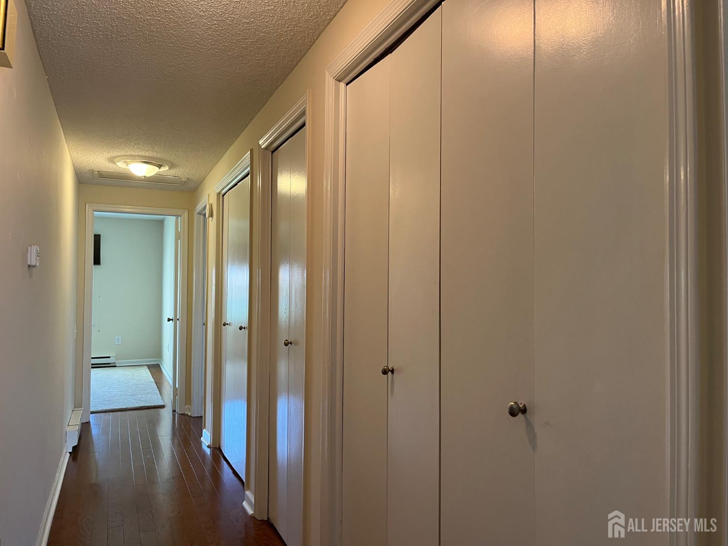 333 Newport Way, Unit C Monroe Township, NJ 08831 - Photo 10 of 17 a bathroom with a shower and a mirror