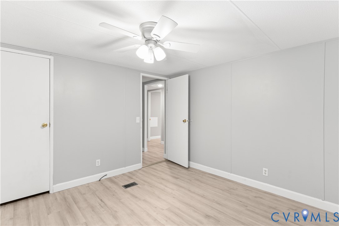403 Virso Road Meherrin, VA 23954 - Photo 22 of 33 a view of an empty room and wooden floor