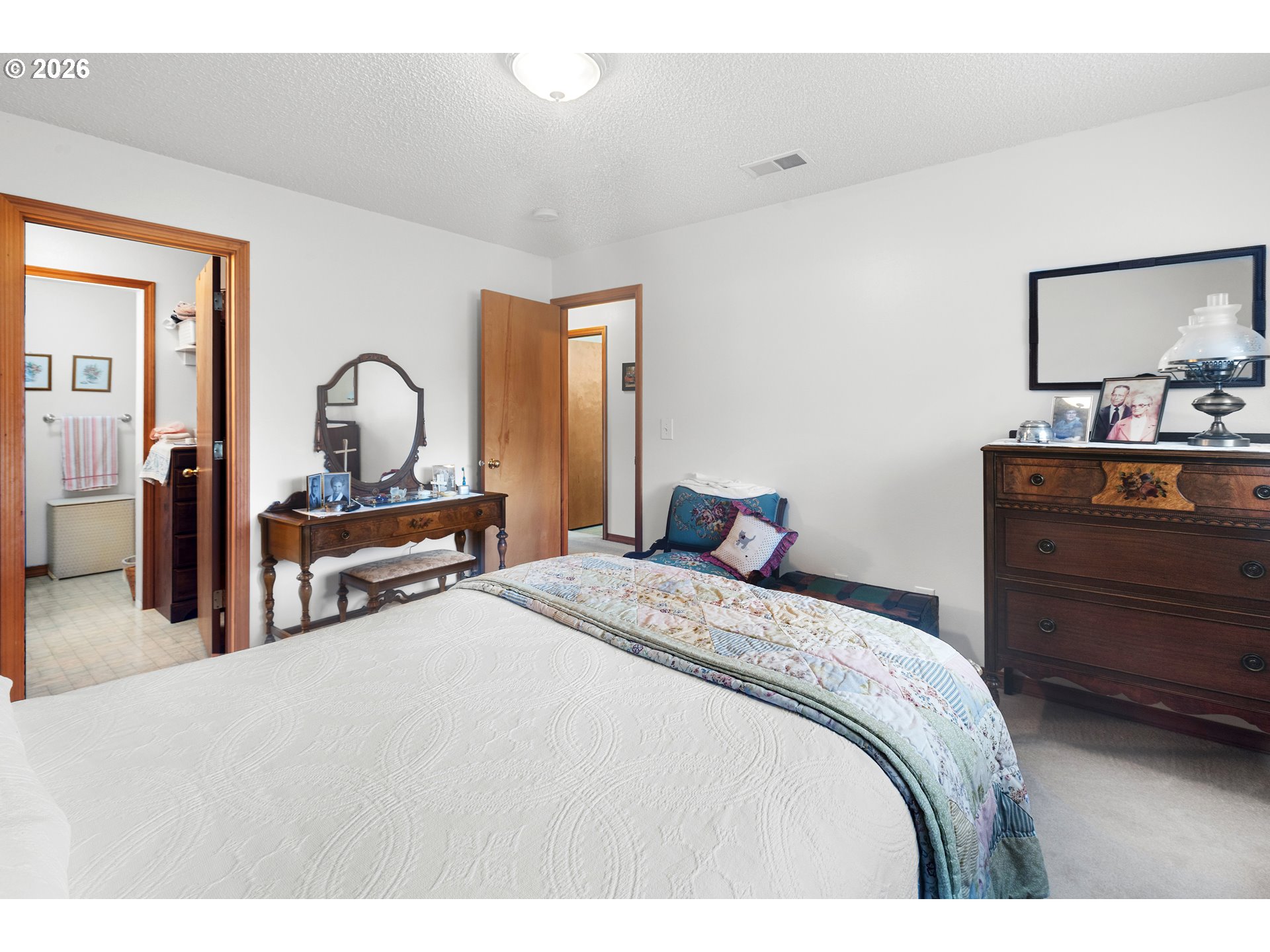 1900 Northwest Carden Avenue, Unit 22 Pendleton, OR 97801 - Photo 16 of 29 a bedroom with a bed and dresser