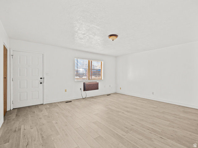 460 200 South Provo, UT 84606 - Photo 13 of 66 Unfurnished living room with light wood-type flooring and baseboards