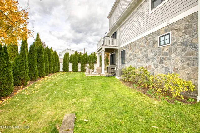 a view of a building with a yard