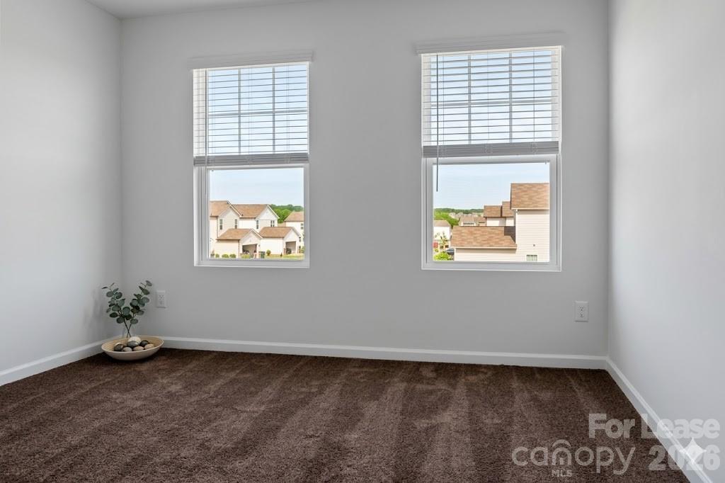 1215 Nesters Store Place Southwest Concord, NC 28027 - Photo 5 of 16 an empty room with a window