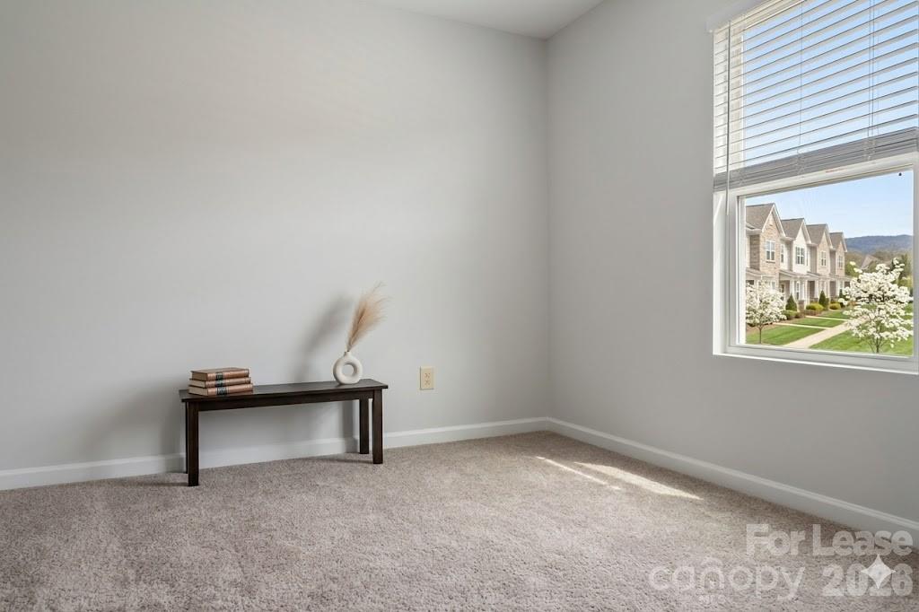 1215 Nesters Store Place Southwest Concord, NC 28027 - Photo 8 of 16 a view of an empty room and window