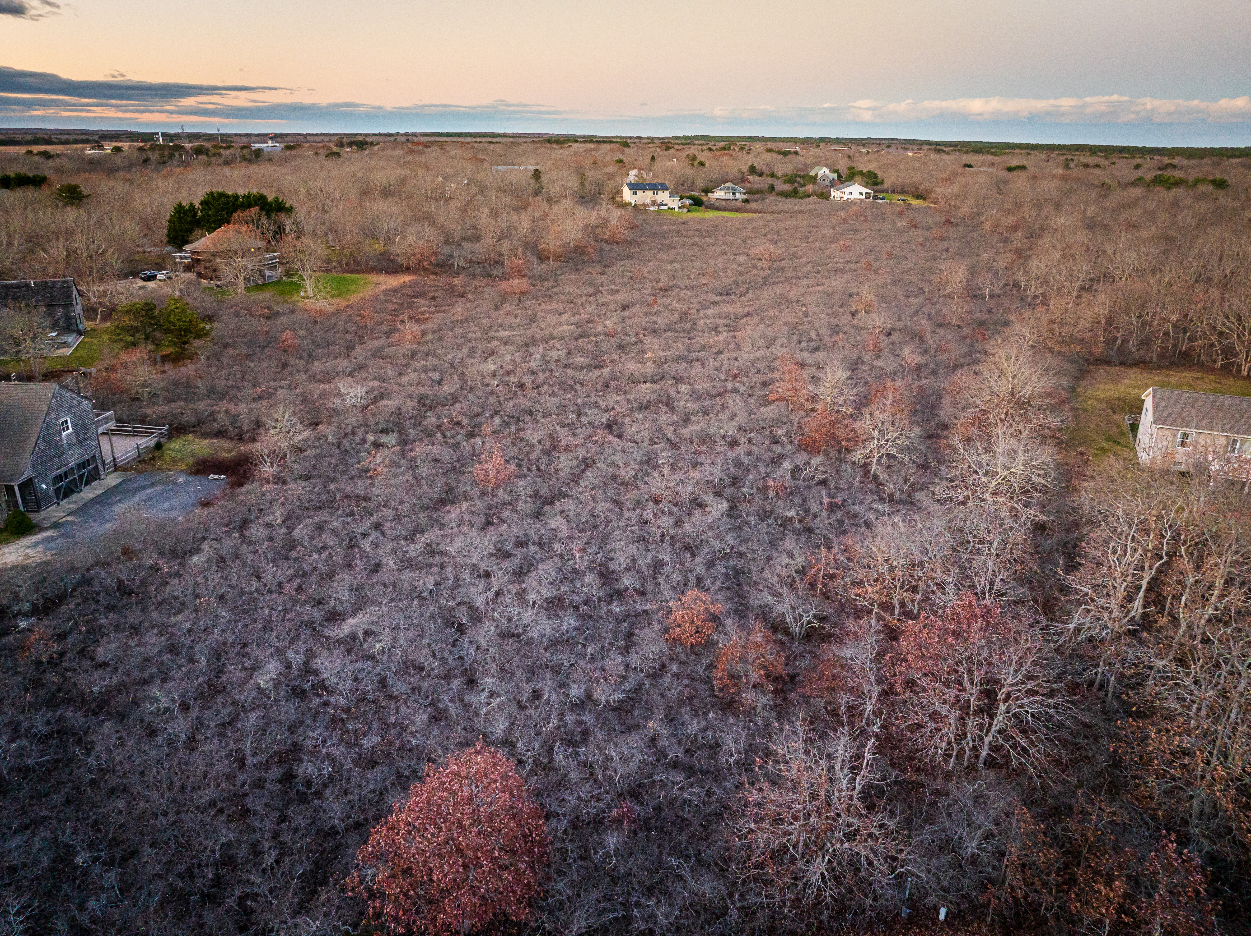 25 Coffins Field Road Edgartown, MA 02539 - Photo 5 of 7 a view of a dry yard with wooden fence