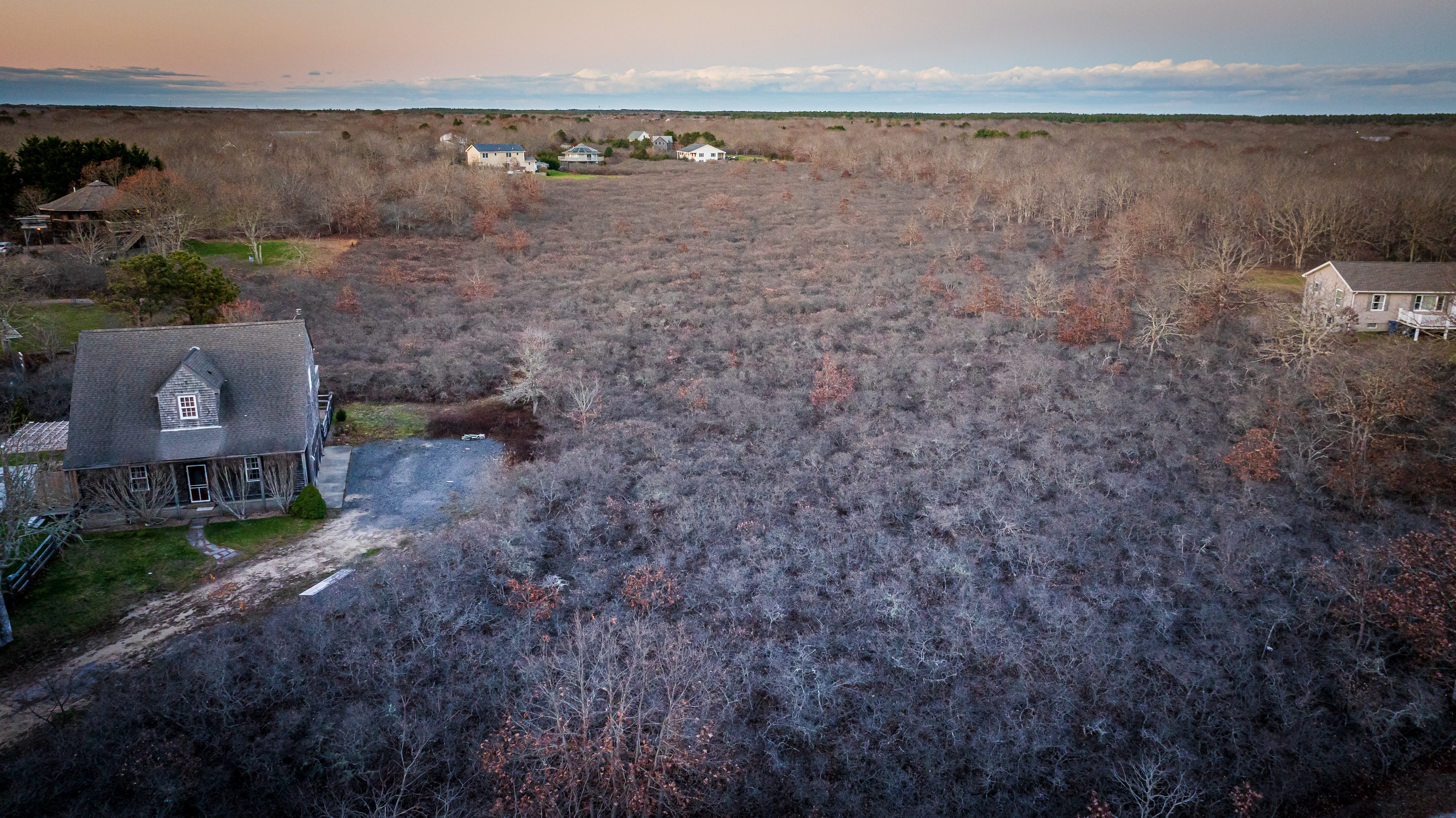 25 Coffins Field Road Edgartown, MA 02539 - Photo 6 of 7 a view of a lake with houses in outdoor space