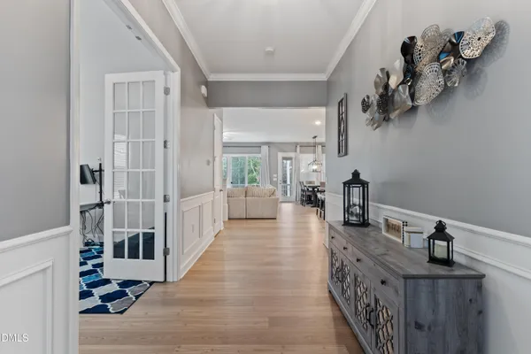a living room with furniture and a rug