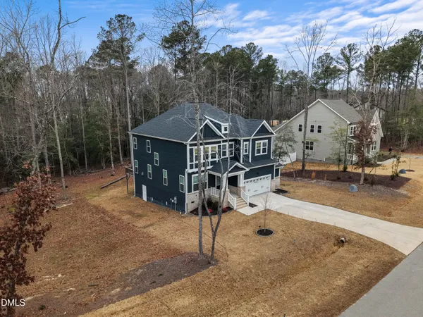 a view of a house with a park