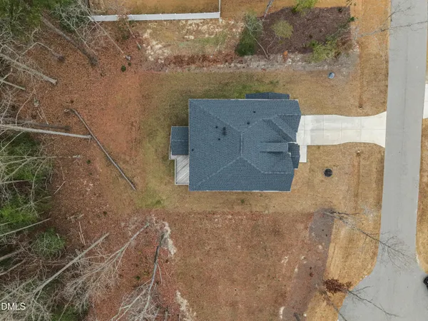 an aerial view of residential house with outdoor space