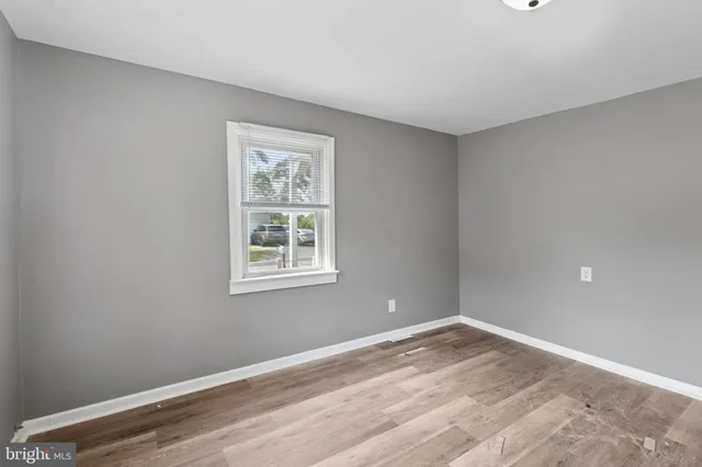 a bathroom with a bathtub a shower and a sink