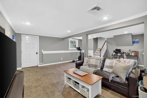 a living room with furniture and a table