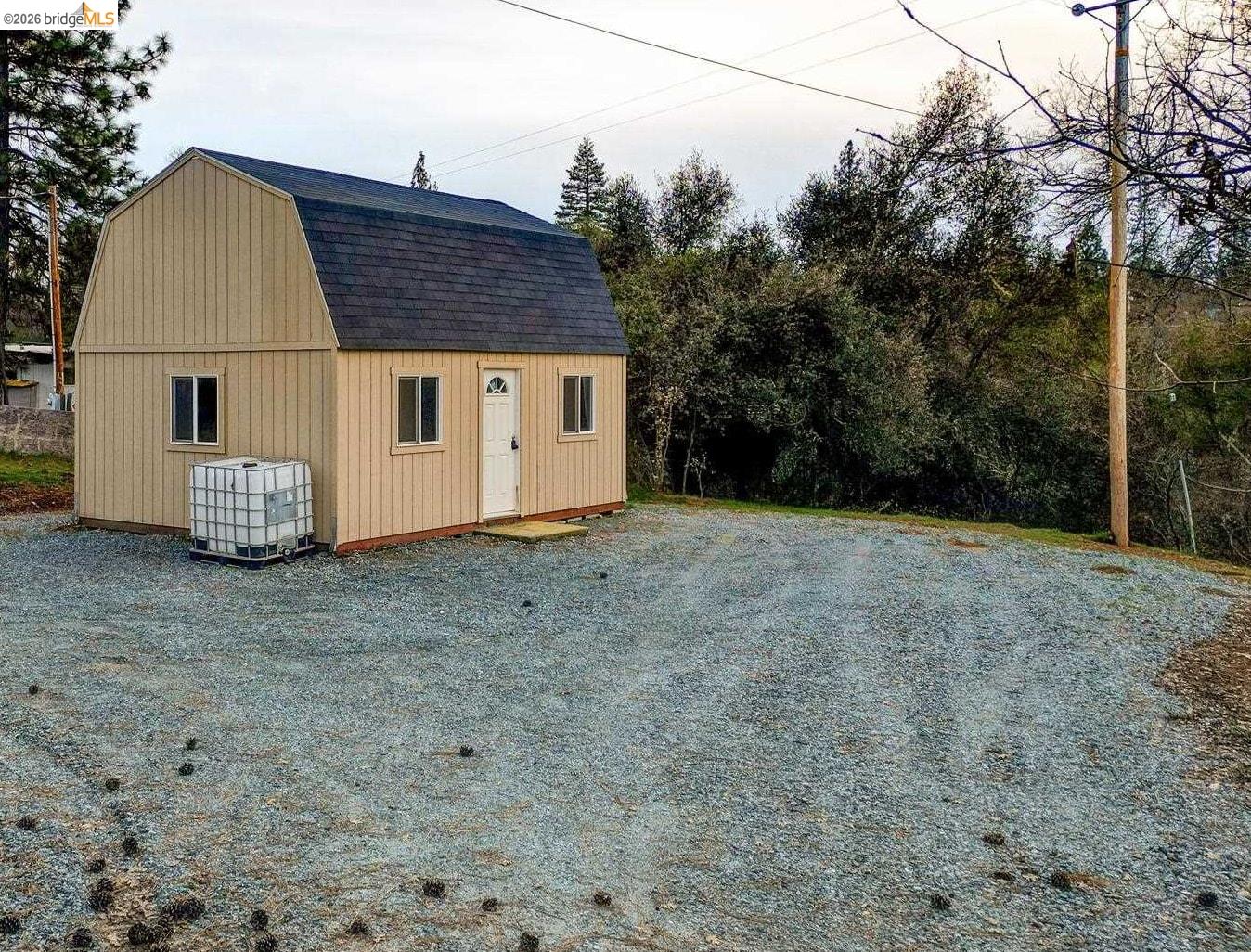 6422 Dogtown Road Coulterville, CA 95311 - Photo 14 of 28 a view of a house with a yard