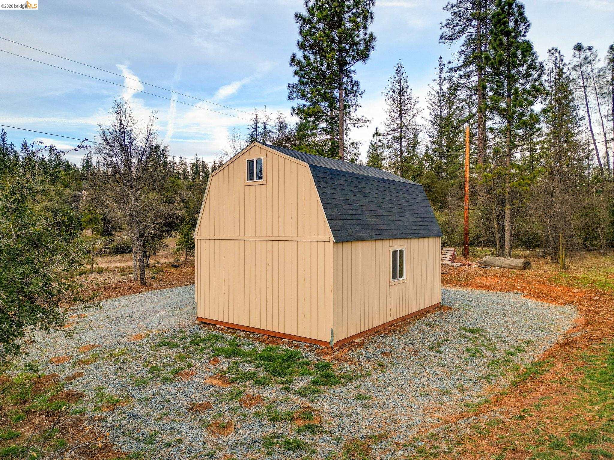 6422 Dogtown Road Coulterville, CA 95311 - Photo 15 of 28 a backyard of a house with lots of green space