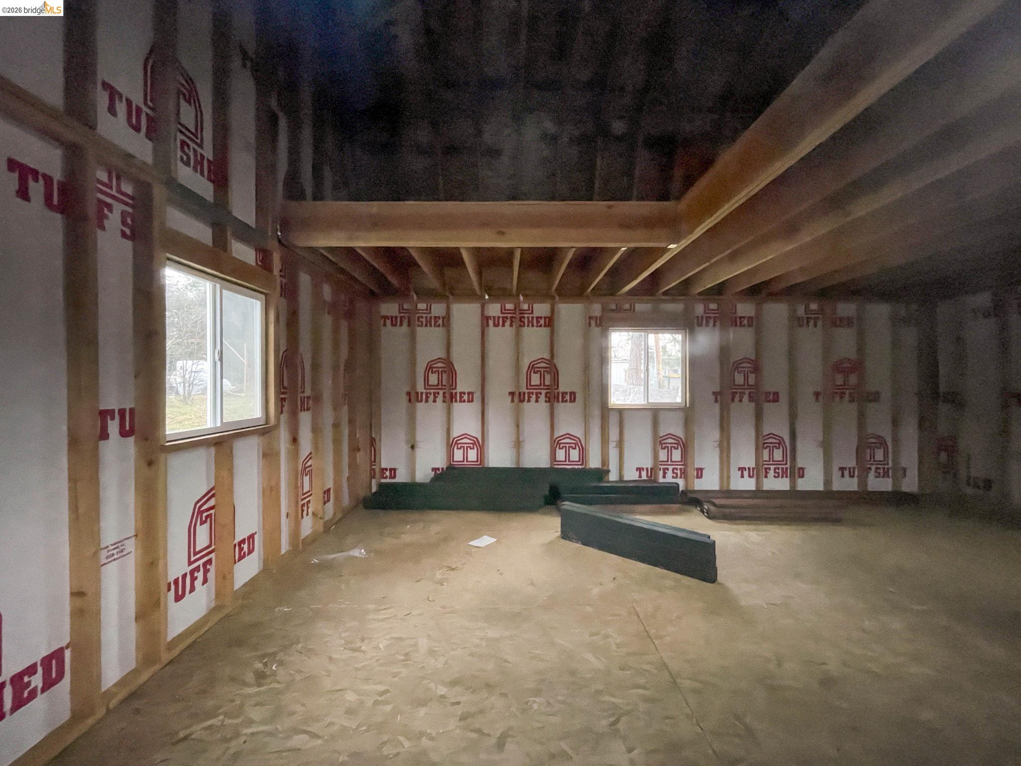 6422 Dogtown Road Coulterville, CA 95311 - Photo 16 of 28 a view of a room with large windows