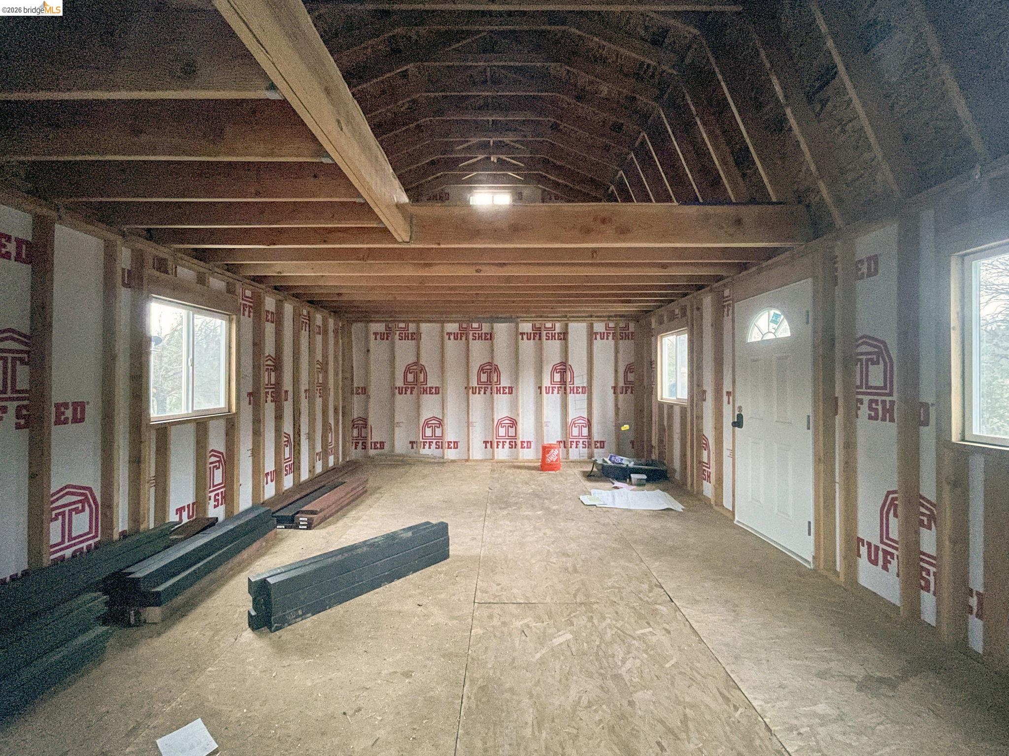 6422 Dogtown Road Coulterville, CA 95311 - Photo 17 of 28 a view of a hall with wooden floor