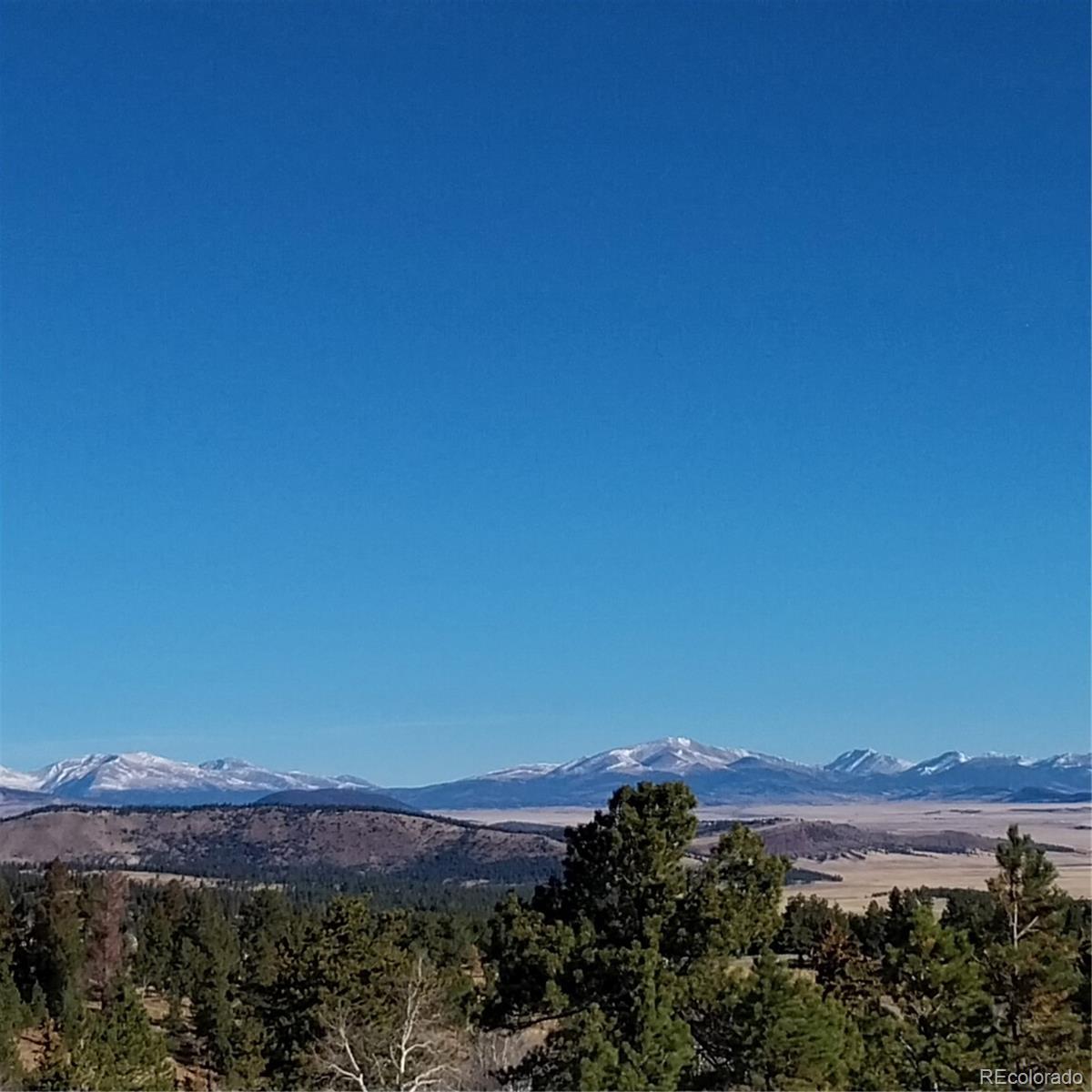 161 Kaufman Road Hartsel, CO 80449 - Photo 11 of 28 a view of a city with sunset