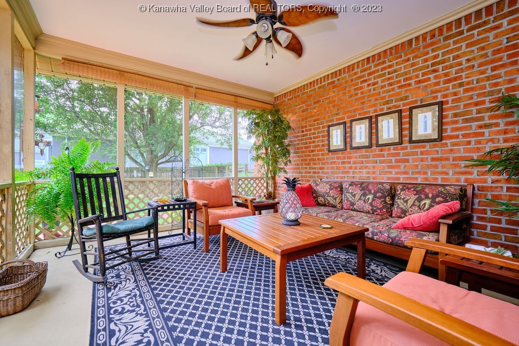303 Heath Road Hurricane, WV 25526 - Photo 26 of 37 Screened porch overlooking expansive back deck.