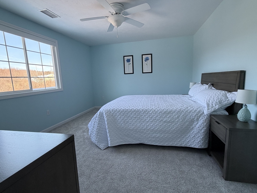 353 Fuller Street, Unit 6 Ludlow, MA 01056 - Photo 14 of 30 a bedroom with a bed and a window
