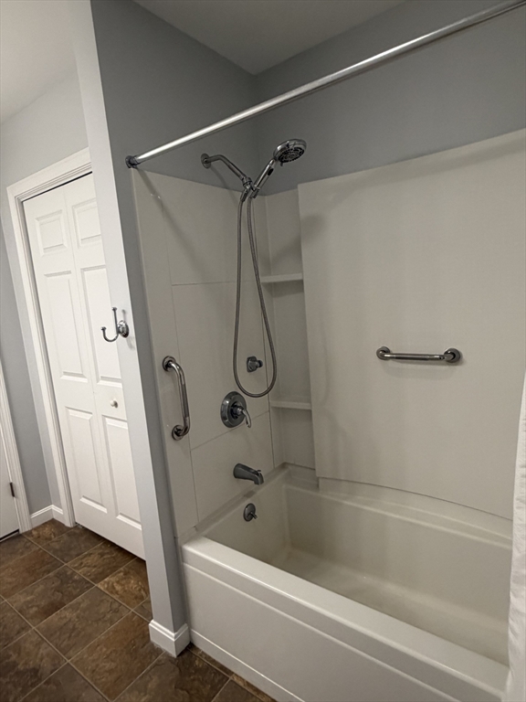 353 Fuller Street, Unit 6 Ludlow, MA 01056 - Photo 20 of 30 a bathroom with a shower and a bath tub