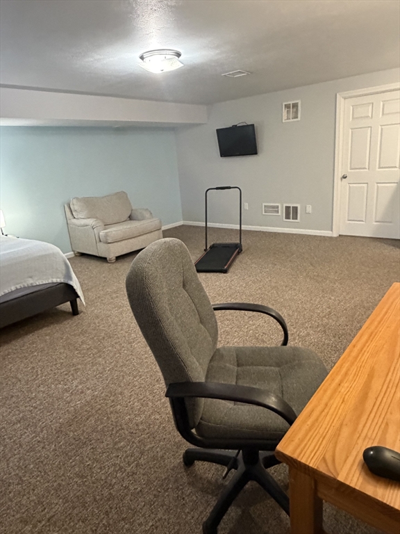 353 Fuller Street, Unit 6 Ludlow, MA 01056 - Photo 24 of 30 a living room with furniture and a window